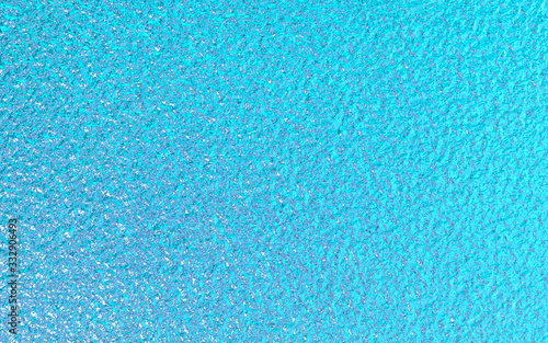 Blue green metallic foil paper texture background.