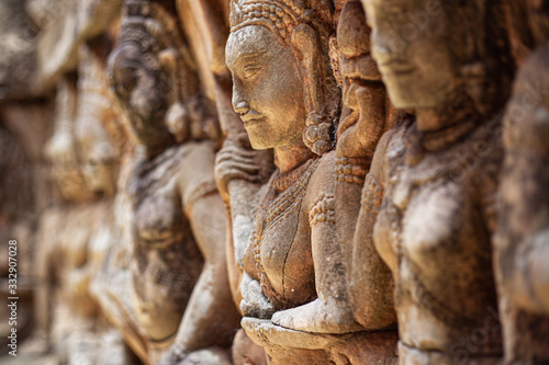 statues carved out of rock in Asian temples