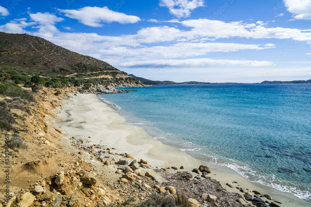 The beautiful turquoise water and white sand of Piscadeddus Beach, near Villasimius, Sardinia.