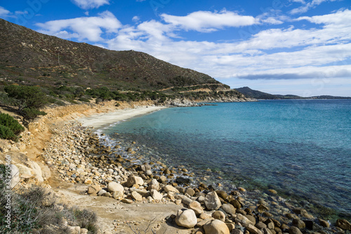 The beautiful turquoise water and white sand of Piscadeddus Beach, near Villasimius, Sardinia.