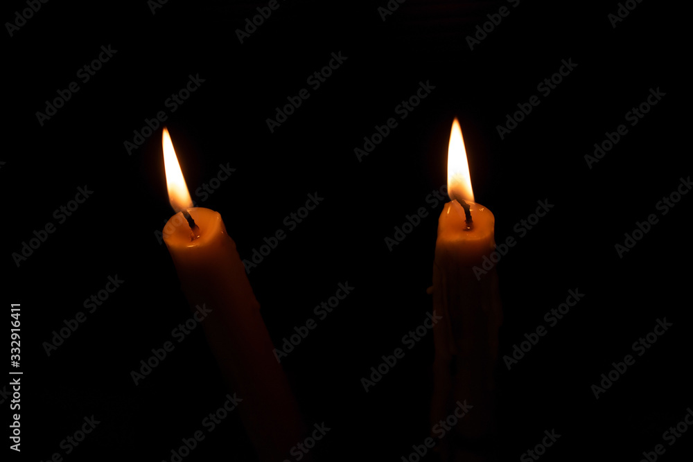 Candles that are lit in the dark Candles that are lit in the dark