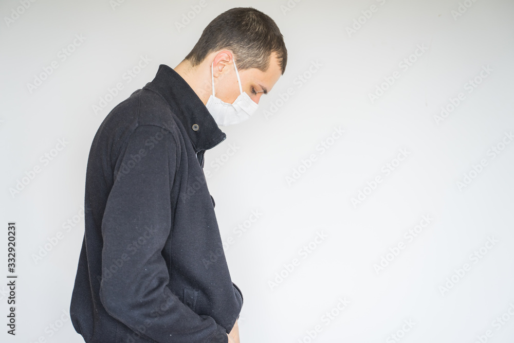 coronavirus, a man in a mask on a white background. Title about the outbreak of the corona virus in China, illness. Epidemic coronavirus, a man in a mask on a white background. Title about the outbreak of the corona virus in China, illness. Epidemic