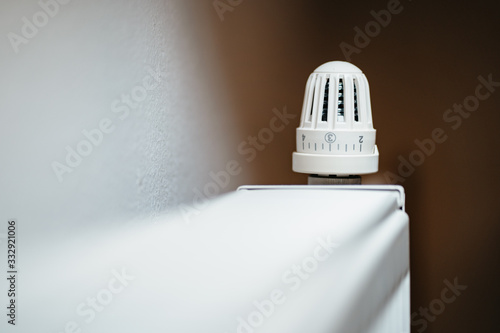 Closeup of a white radiator thermostat