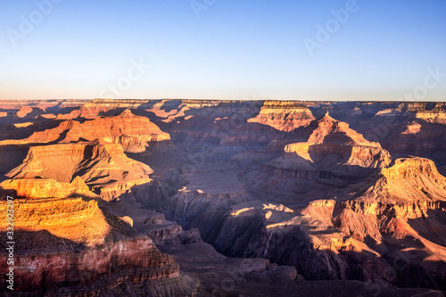 Beautiful view of the Grand Canyon in the light of the rising sun © Artem