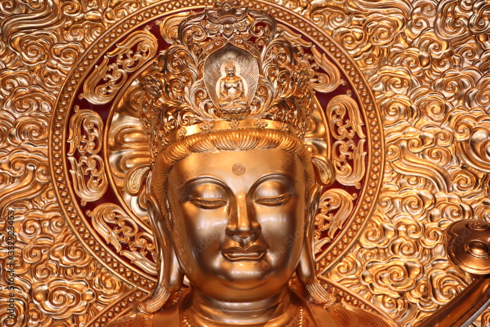  detail of the golden buddha at the jade buddha temple in shanghai