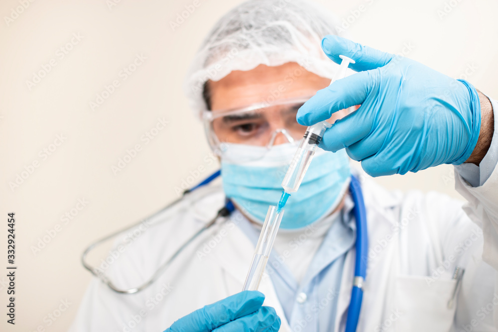 caucasian doctor with syringe caucasian doctor with syringe
