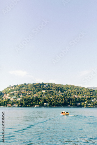  boat on the lake, italian mountain lake