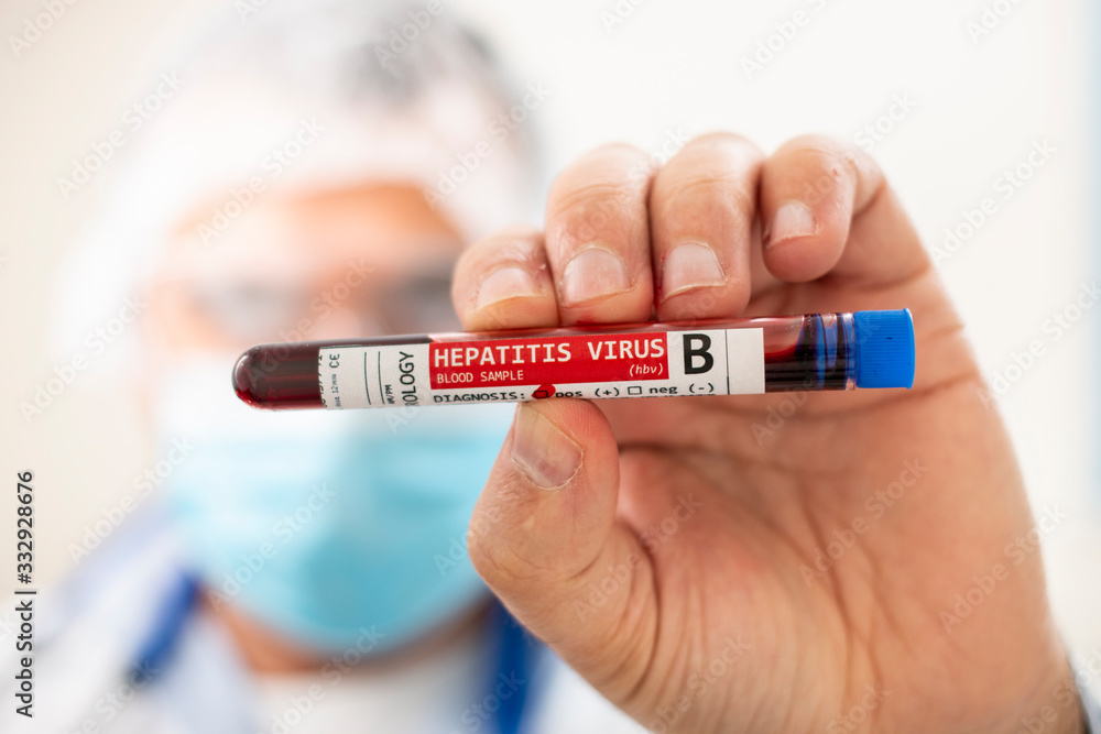 Fototapeta premium Doctor holding test tube blood sample