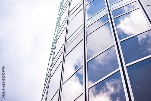 underside panoramic and perspective view to steel blue glass high rise building skyscrapers  business concept of successful industrial architecture