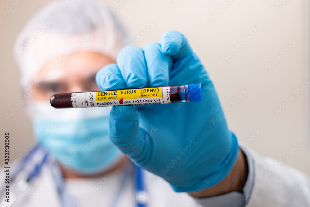 Doctor holding test tube blood sample Doctor holding test tube blood sample