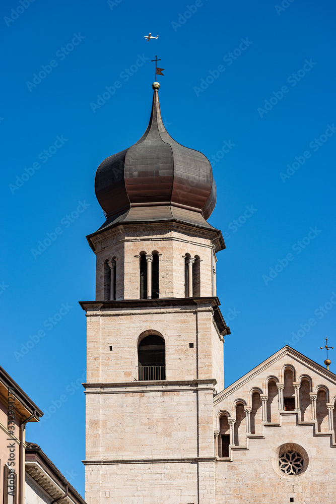 Closeup of the Bell tower of the San Vigilio Cathedral (Duomo di Trento, 1212-1321) in Romanesque style, Trento downtown, Trentino-Alto Adige, Italy, Europe