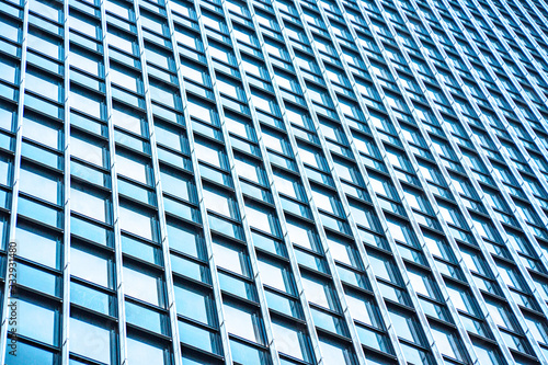 underside panoramic and perspective view to steel blue glass high rise building skyscrapers, business concept of successful industrial architecture