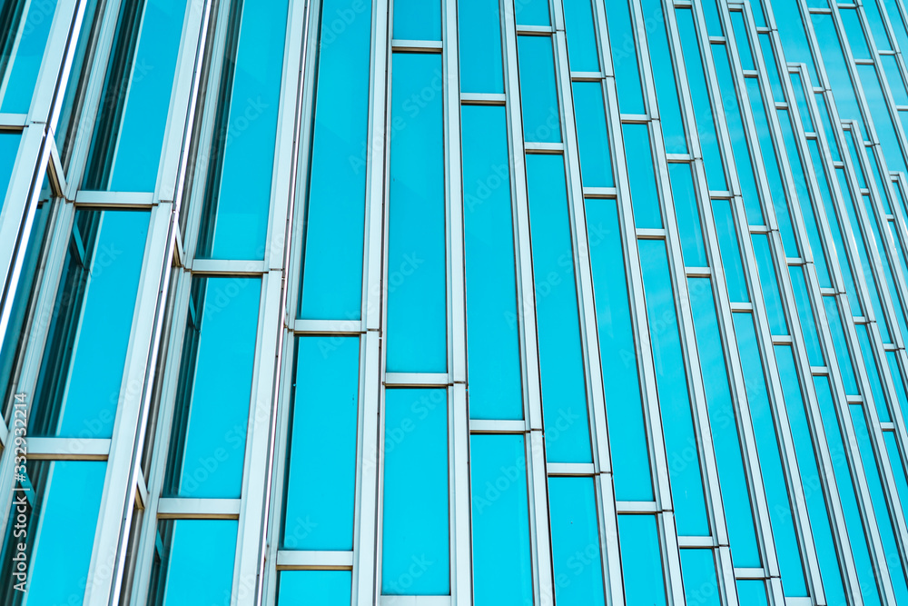 Obraz premium underside panoramic and perspective view to steel Tiffany blue glass high rise building skyscrapers, business concept of successful industrial architecture