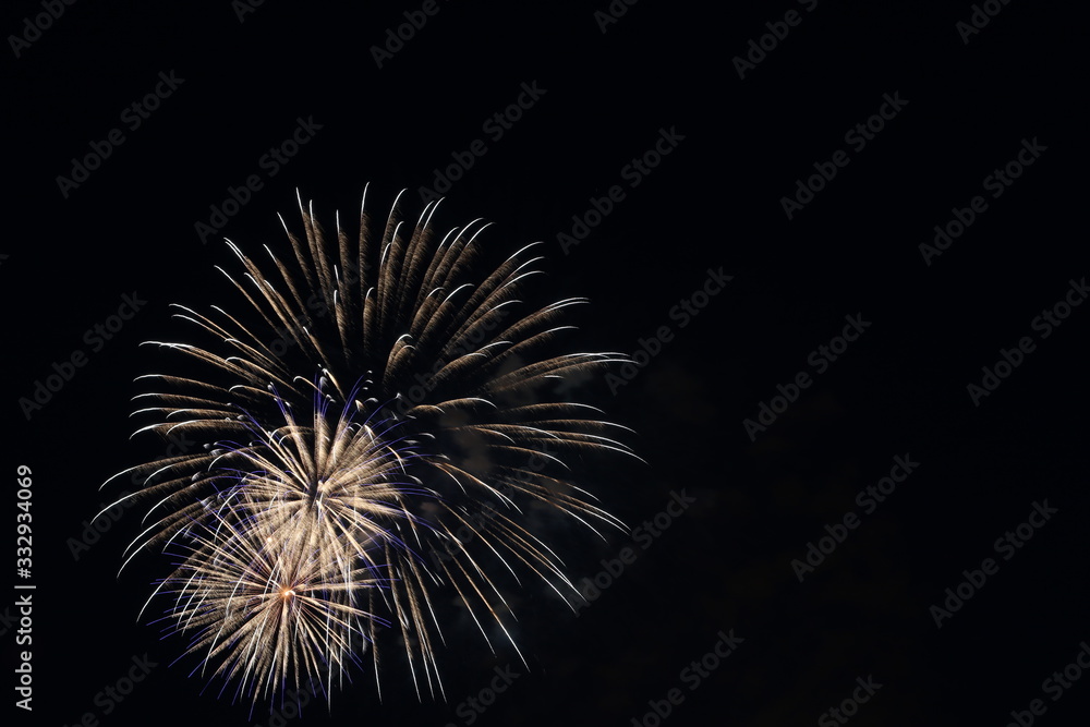 Salute on city day in Tver on the background of the bridge over the Volga river
