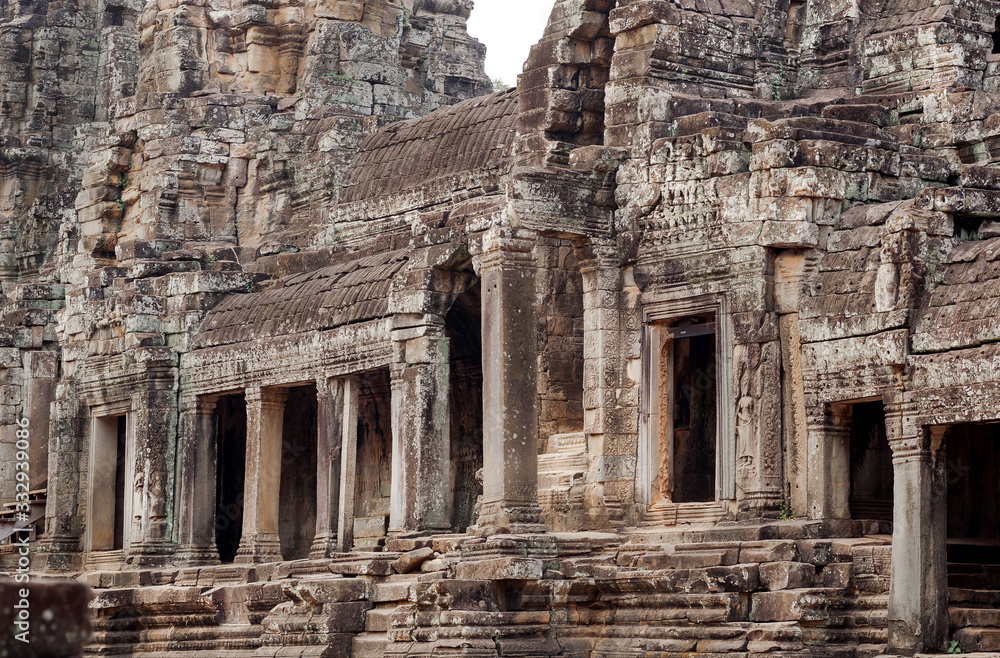 Empty space around towers of the 12th century Bayon temple, Cambodia. Historical walls in Angkor. UNESCO world heritage site
