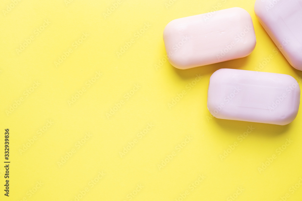 Natural soap on a yellow background. Flat lay the concept of Spa cleanliness of hands. copy space Natural soap on a yellow background. Flat lay the concept of Spa cleanliness of hands. copy space
