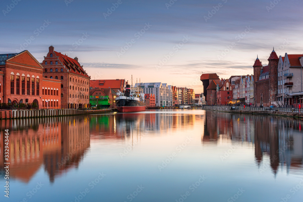 Gdansk with beautiful old town over Motlawa river at sunset, Poland.