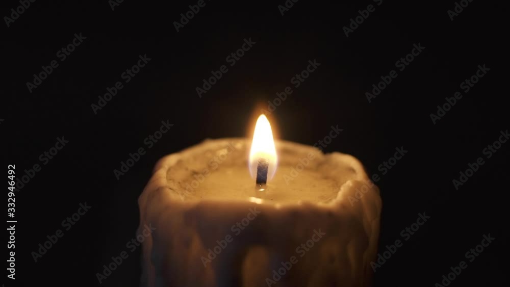 Blowing Out Of An Old Wax Coated Block Candle At Night Close Up Blowing Out Of An Old Wax Coated Block Candle At Night Close Up