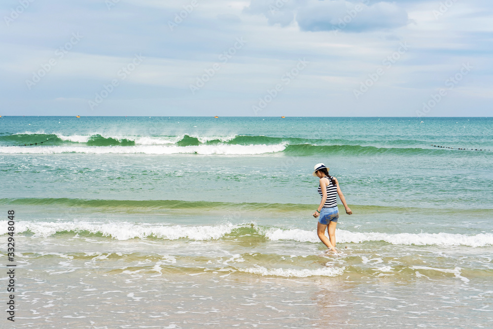 Young girl at the China Beach Danang Vietnam Young girl at the China Beach Danang Vietnam