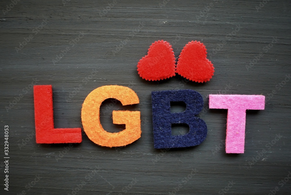 Rainbow flag background of LGBT alternative sex on the old vintage wood scene. Love is love.pride, lgbt concept. Rainbow flag background of LGBT alternative sex on the old vintage wood scene. Love is love.pride, lgbt concept.