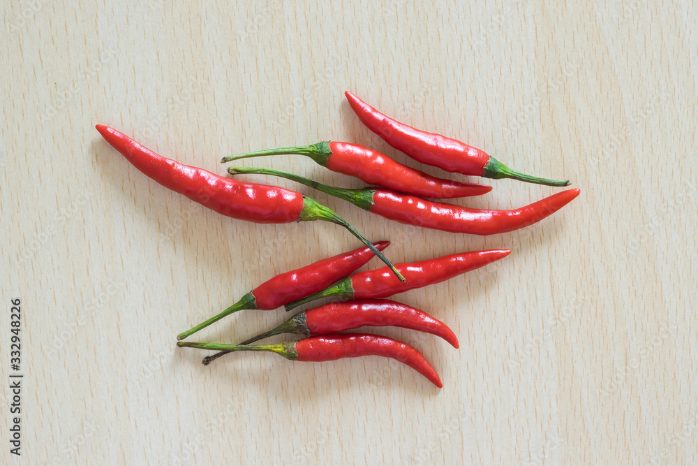 Red hot chili on the wood table. Red hot chili on the wood table.