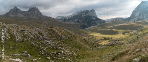 Breathtaking landscape of mountain ranges. Majestic stone hills. Panorama © Artem