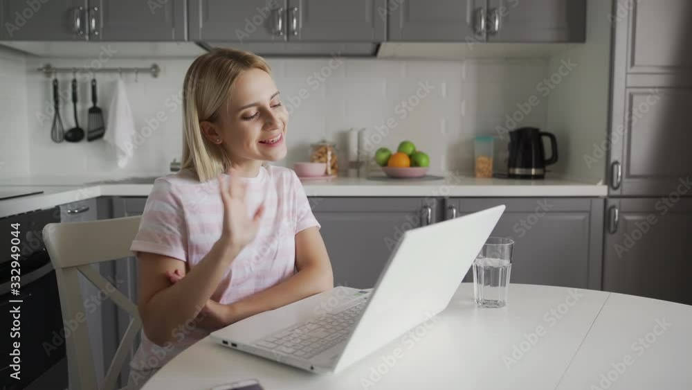 Happy woman talking at computer. Smiling person having online chat Happy woman talking at computer. Smiling person having online chat