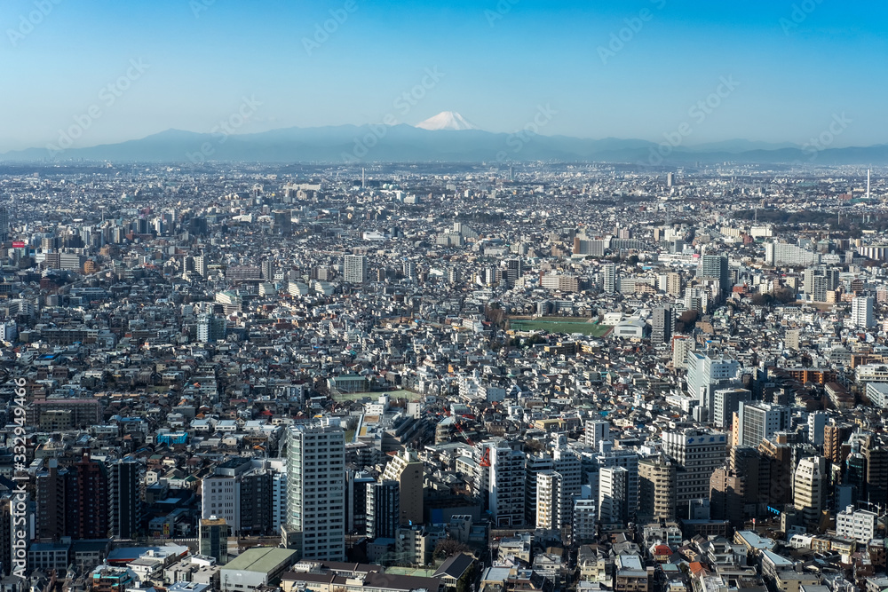 Mountain Fuji with cityscape of Tokyo and skylines. Taken from Tokyo metropolitan government building. Japan travel landmark.