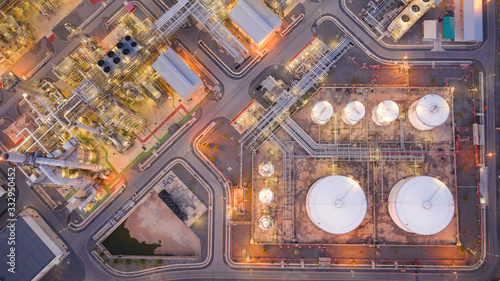 Obraz na plátně Aerial view of Oil refinery plant in twilight time, Petrochemical industry is important to the global economy