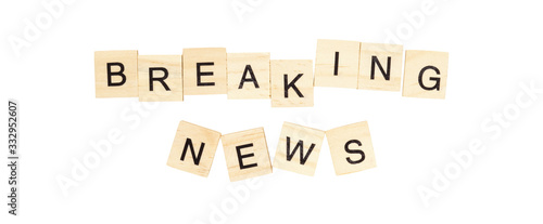 The words "Breaking News" spelt out with letter tiles on the white background