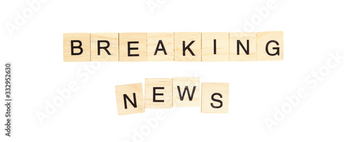 The words "Breaking News" spelt out with letter tiles on the white background