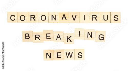The words `Coronavirus Breaking News` spelt out with letter tiles on the white background
