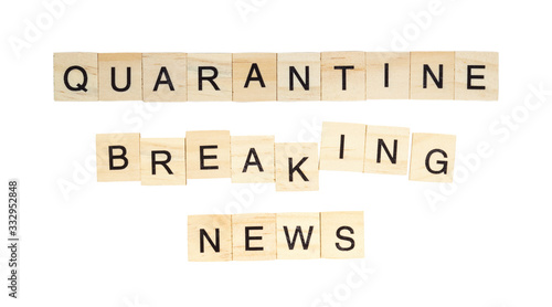The words "Quarantine Breaking News" spelt out with letter tiles on the white background