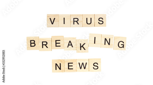 The words "Virus Breaking News" spelt out with letter tiles on the white background