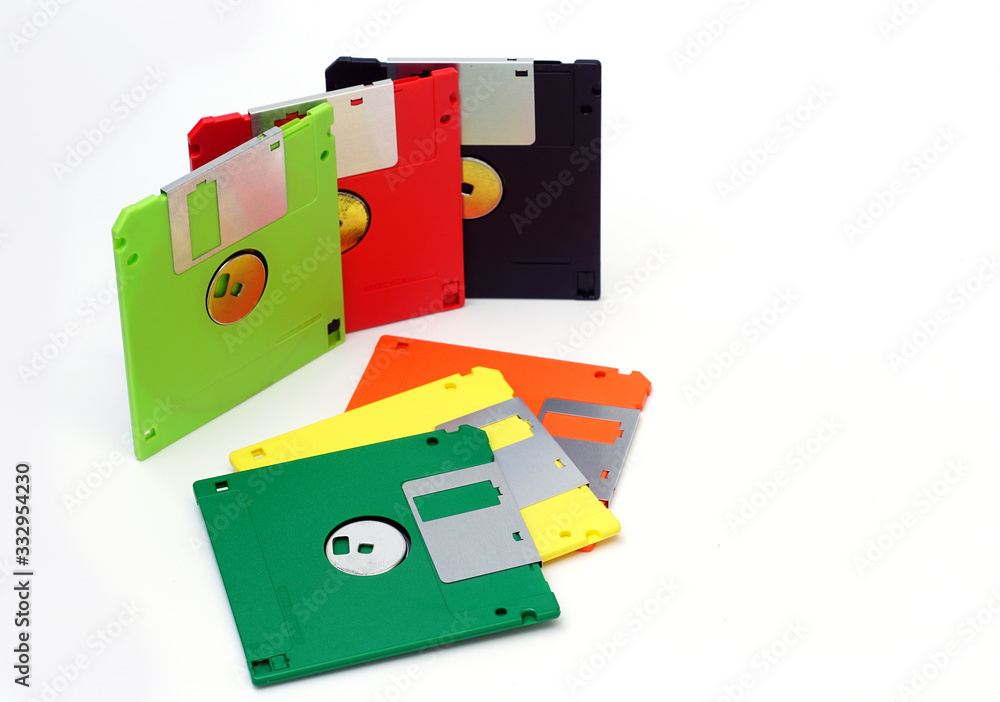 Old floppy disk on a white background.Multi-color floppy disk. Old floppy disk on a white background.Multi-color floppy disk.