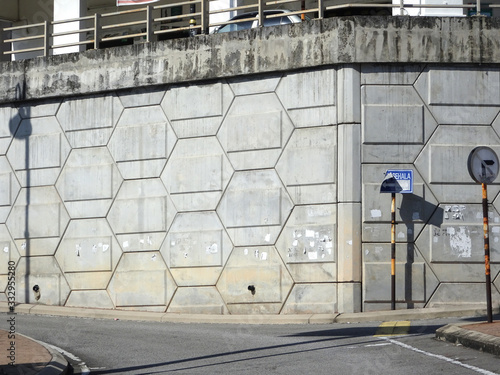 SEREMBAN, MALAYSIA -JUNE 3, 2019: Re-wall mainly called as “Reinforced Earth- wall” is precast concrete panel constructed with artificial reinforcing and mainly used for retaining walls.  photo