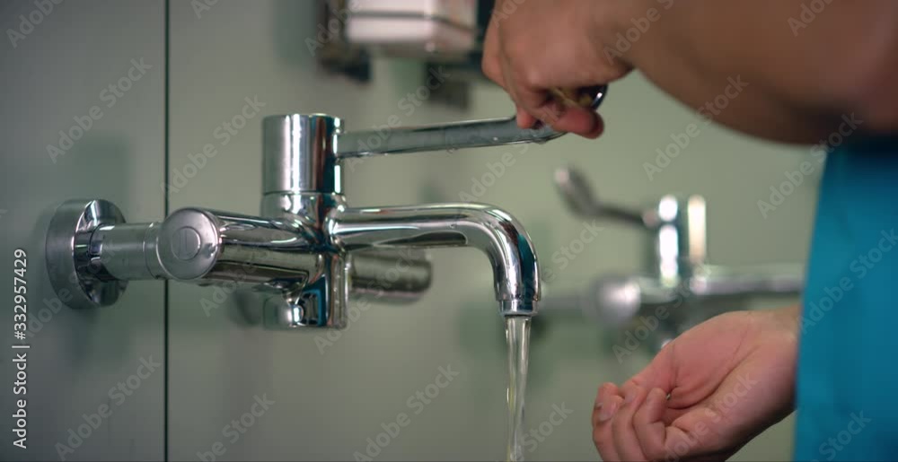 Female Medical Worker Washes Hands Female Medical Worker Washes Hands