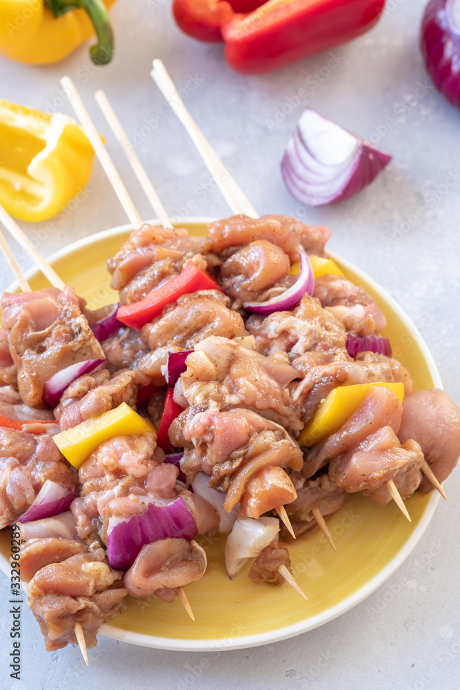 Homemade Raw Chicken Shish Kebabs with Peppers and Onions Homemade Raw Chicken Shish Kebabs with Peppers and Onions
