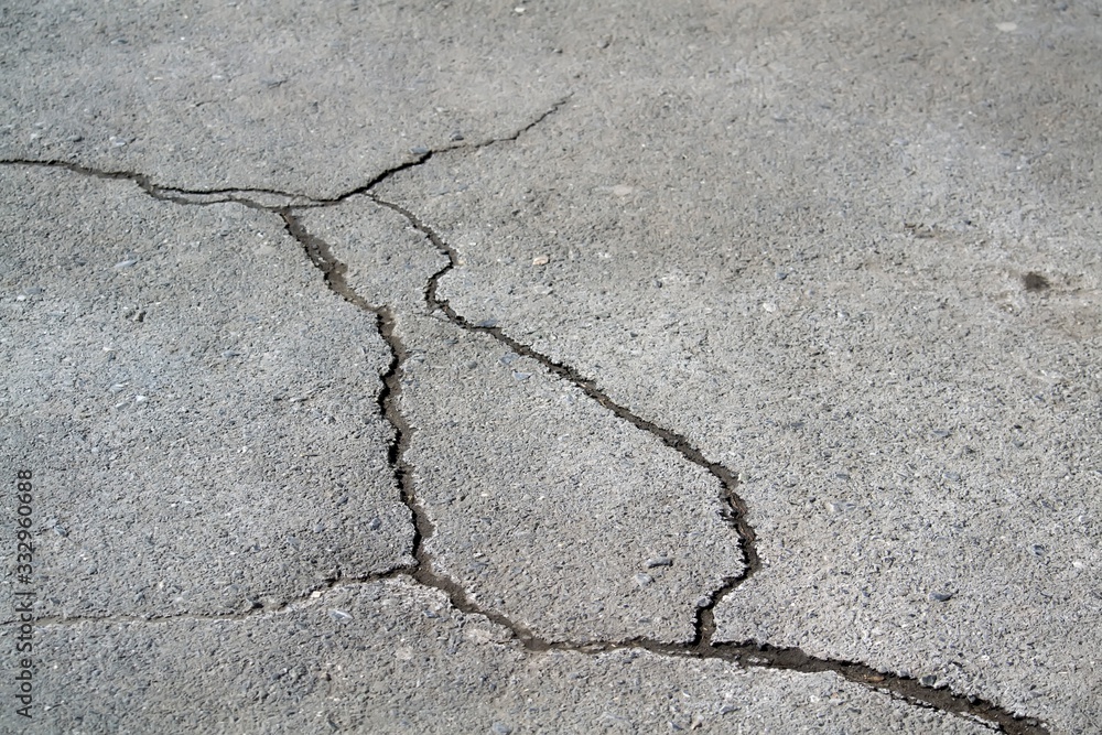 Fototapeta premium Large cracks in the asphalt