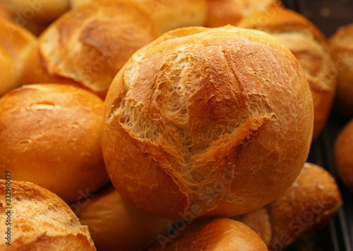 Close up fresh wheat bread buns on retail display