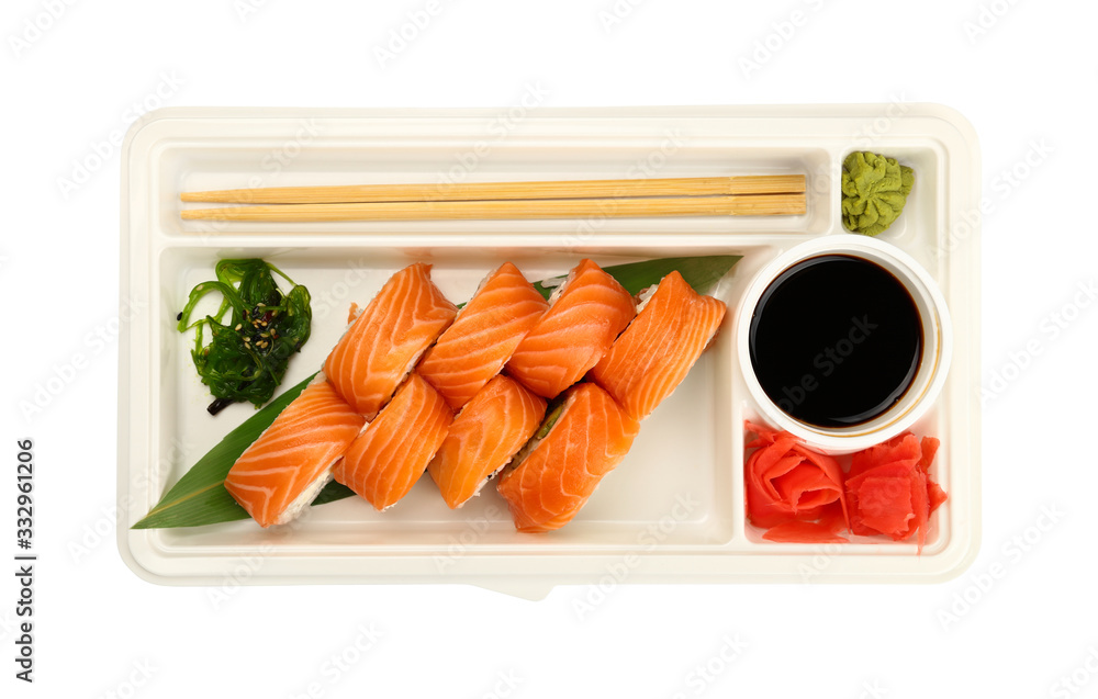 Take away set of salmon sushi rolls on white Take away set of salmon sushi rolls on white