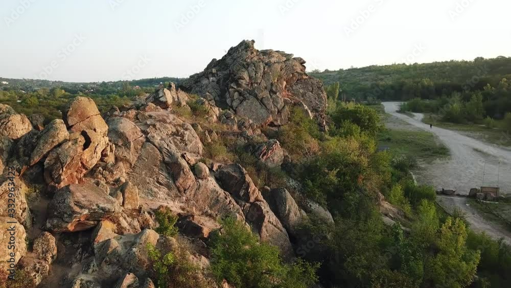 aerial view of granite rock at sunrise, aerial view of river rapids at sunrise, flight over rock in the river, Stream Water and Rocks, Granite boulders with river, aerial view of river and green trees aerial view of granite rock at sunrise, aerial view of river rapids at sunrise, flight over rock in the river, Stream Water and Rocks, Granite boulders with river, aerial view of river and green trees