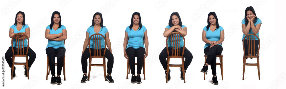Obraz premium woman sitting with rotated chair on white