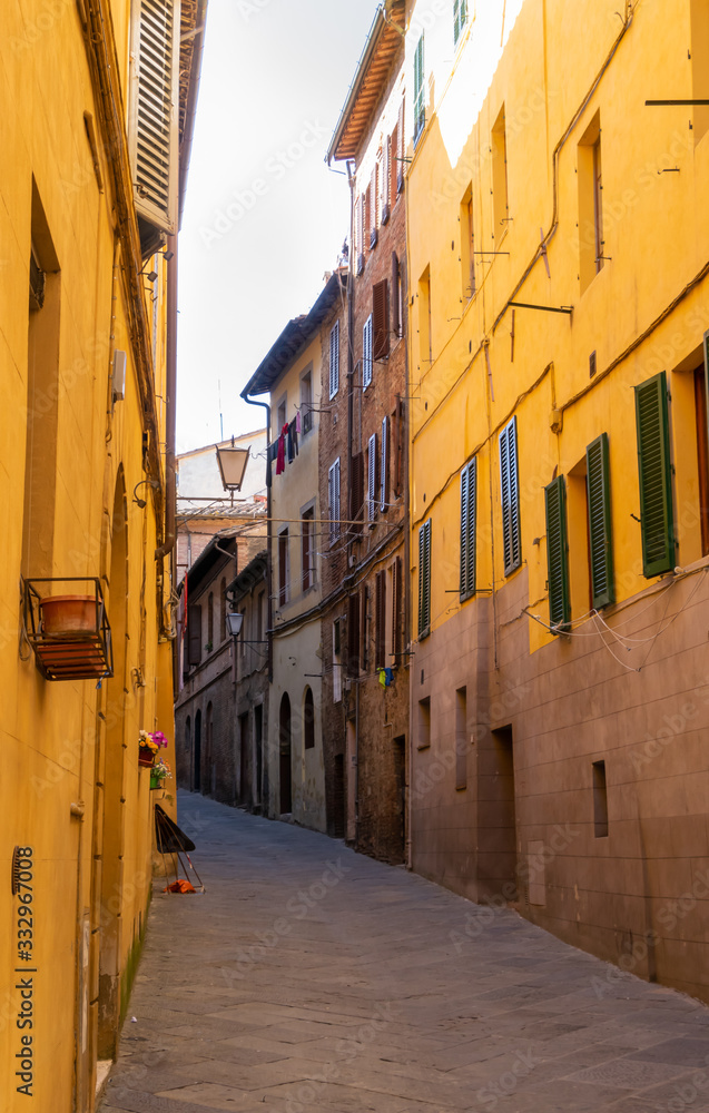 Narrow street in Siena, Italy