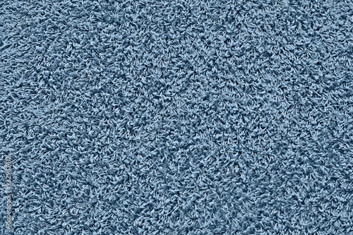 Carpet texture, classic blue color background. Floor. Backdrop.