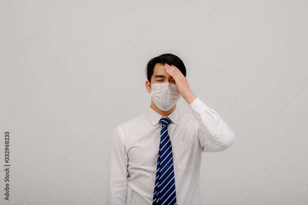 Asian male coughing, sneezing or having a runny nose and fever. Asian men exposed to coronavirus infection, coronavirus concept 2019 Asian male coughing, sneezing or having a runny nose and fever. Asian men exposed to coronavirus infection, coronavirus concept 2019