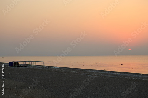 sunrise or sunset over the sea beach