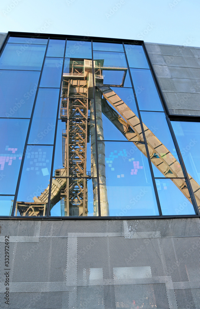 Headframe of C-mine in Belgium reflected in glass	