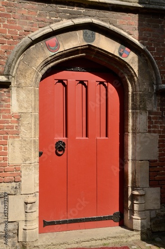 Red door in Ghent, Belgium © monysasi