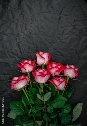 bouquet of red roses  on a black background